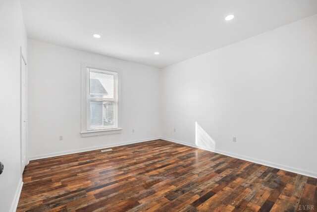 1004 Buchanan, Lynchburg, VA 24501 - spare room featuring wood finished floors, baseboards, and recessed lighting