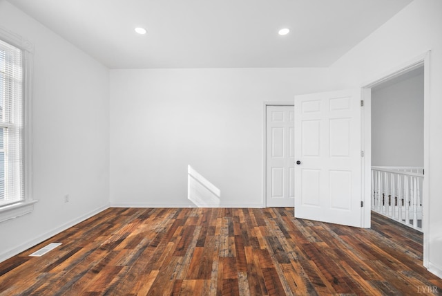 1004 Buchanan, Lynchburg, VA 24501 - unfurnished bedroom featuring multiple windows, hardwood / wood-style floors, recessed lighting, a closet, and baseboards