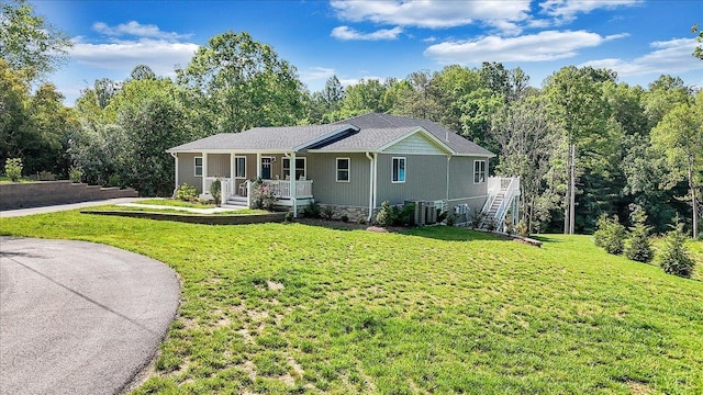 1620 Stripers Cove Rd, Goodview, VA 24095 - ranch-style house featuring a porch and a front lawn