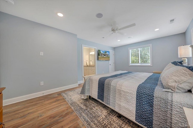 1620 Stripers Cove Rd, Goodview, VA 24095 - bedroom featuring wood finished floors, ceiling fan, baseboards, recessed lighting, and ensuite bathroom