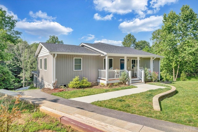 1620 Stripers Cove Rd, Goodview, VA 24095 - single story home with a porch, a front yard, and a shingled roof