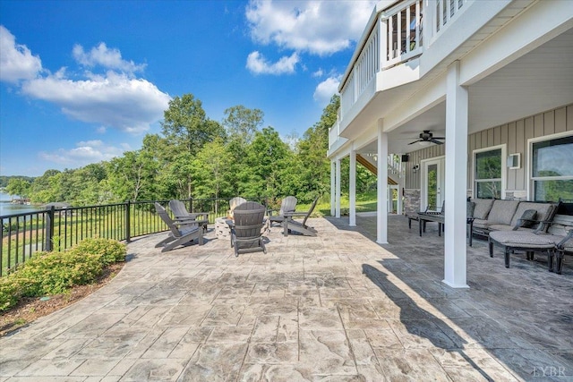 1620 Stripers Cove Rd, Goodview, VA 24095 - view of patio / terrace with ceiling fan, a fire pit, and a balcony