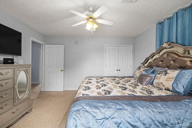 4710 Hummingbird Ln, Concord, VA 24538 - carpeted bedroom featuring a textured ceiling, a ceiling fan, baseboards, and a closet