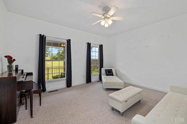 4710 Hummingbird Ln, Concord, VA 24538 - living area featuring carpet, baseboards, and a ceiling fan