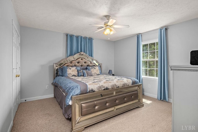 4710 Hummingbird Ln, Concord, VA 24538 - bedroom featuring a textured ceiling, carpet, baseboards, and a ceiling fan