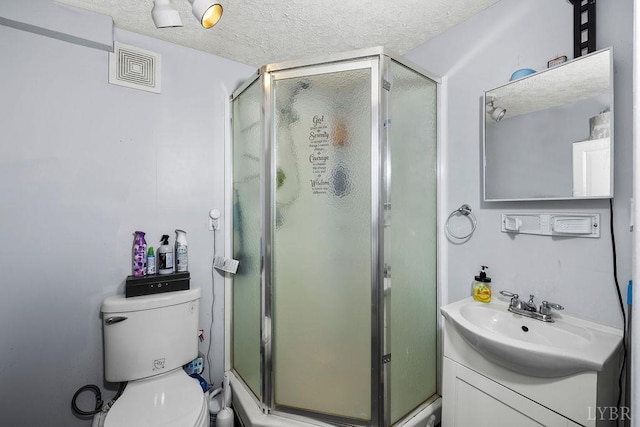 4710 Hummingbird Ln, Concord, VA 24538 - full bathroom with vanity, a shower stall, toilet, and a textured ceiling