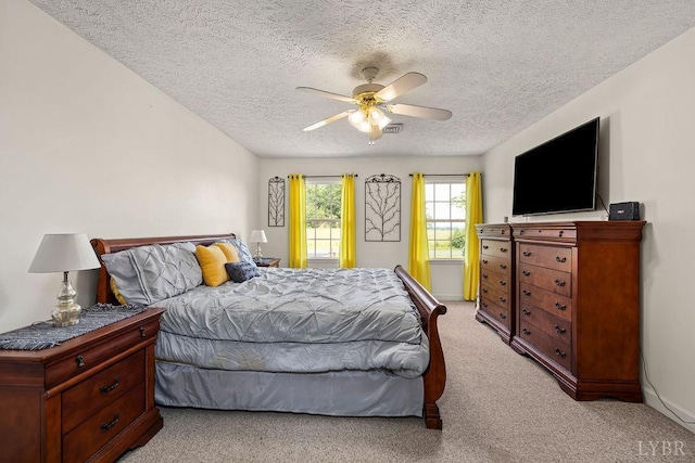 4710 Hummingbird Ln, Concord, VA 24538 - bedroom featuring light carpet, a textured ceiling, and ceiling fan