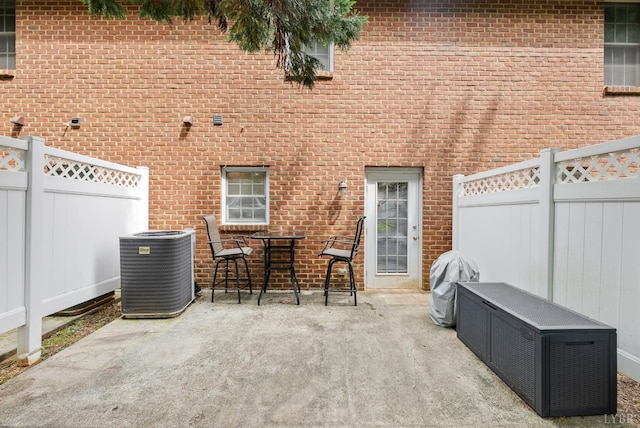 824 Wiggington Rd Unit 303, Lynchburg, VA 24502 - fenced backyard with central AC unit, a patio, and area for grilling