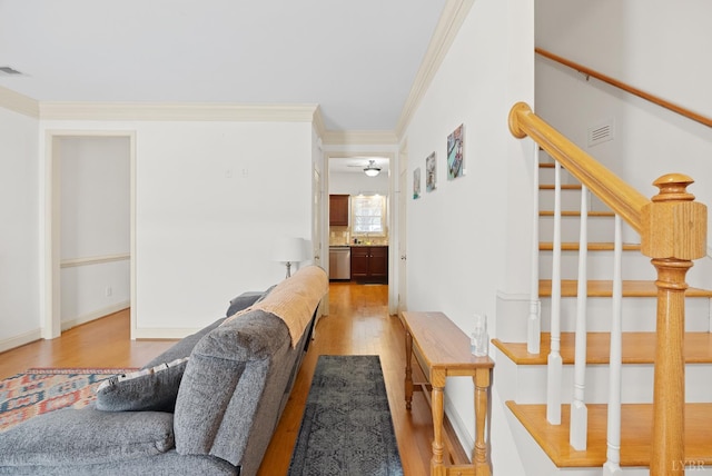 824 Wiggington Rd Unit 303, Lynchburg, VA 24502 - living area with light wood-style flooring, stairway, ornamental molding, a ceiling fan, and baseboards