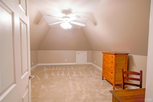bonus room featuring light carpet, lofted ceiling, and a ceiling fan