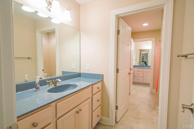 full bathroom featuring vanity, tile patterned flooring, and recessed lighting