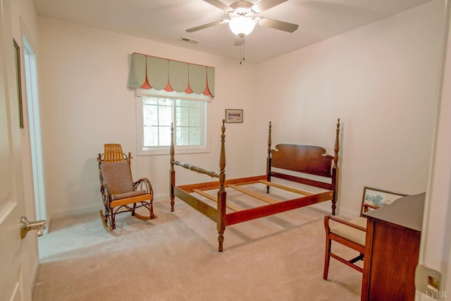 bedroom featuring carpet and baseboards