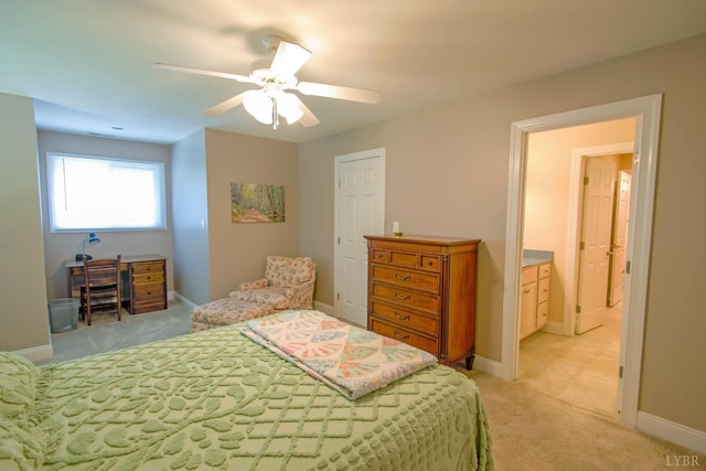 bedroom featuring light colored carpet and ceiling fan
