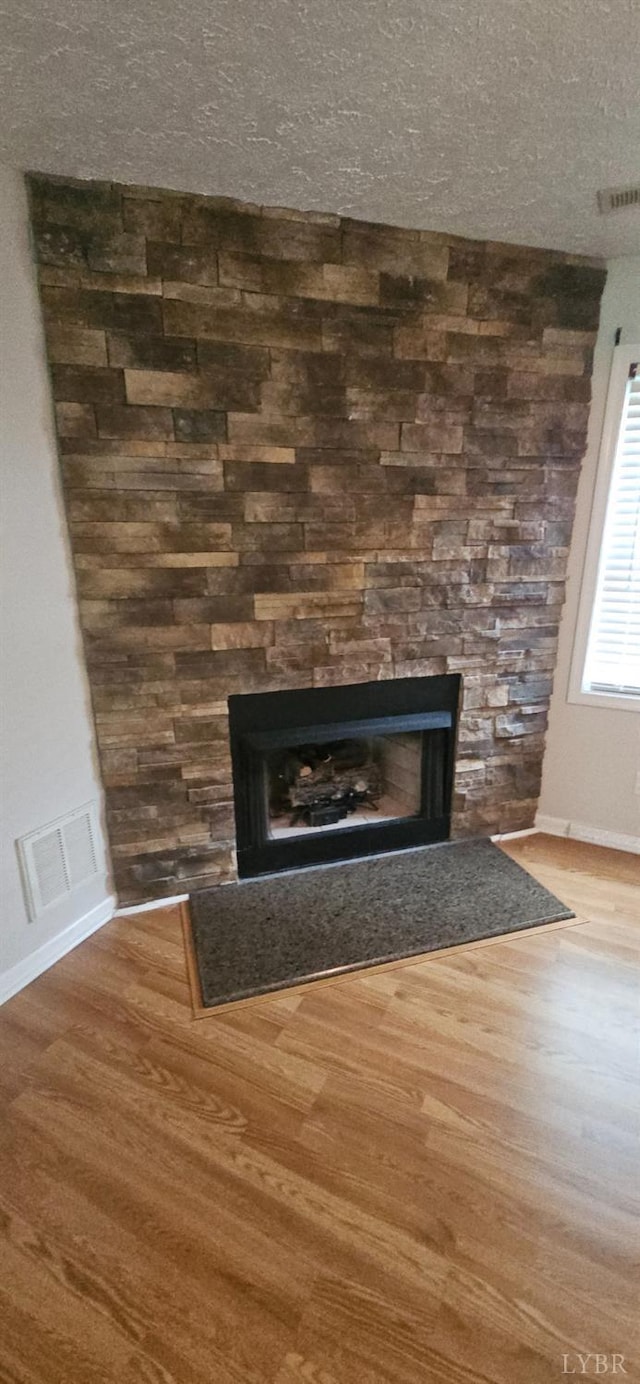 511 Bent Oak Ct, Lynchburg, VA 24502 - detailed view of wood finished floors and a stone fireplace