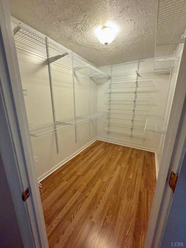 511 Bent Oak Ct, Lynchburg, VA 24502 - walk in closet with wood finished floors