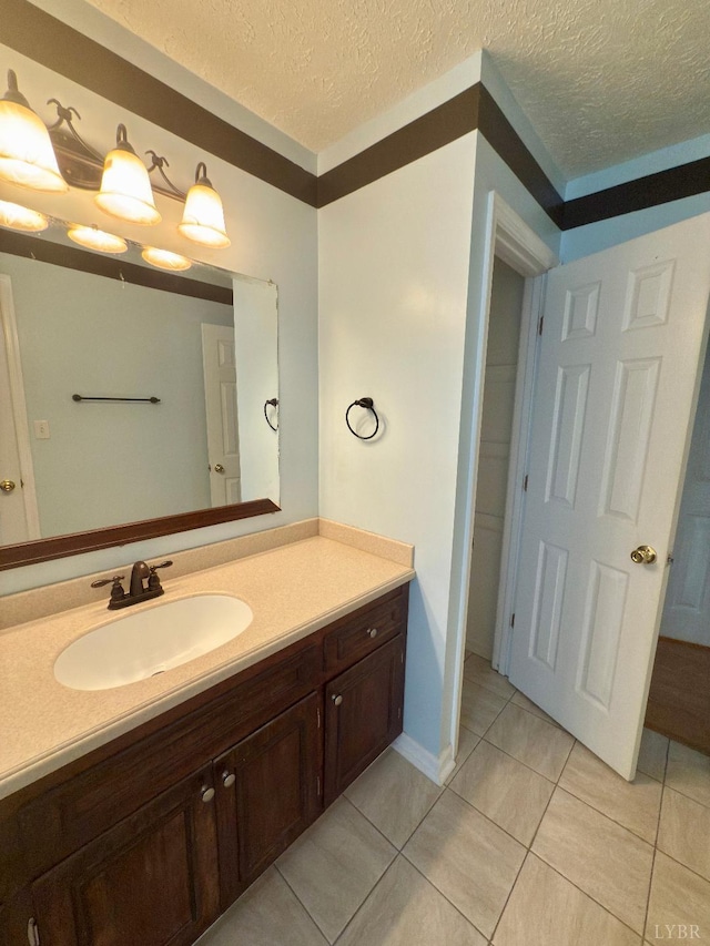 511 Bent Oak Ct, Lynchburg, VA 24502 - bathroom with vanity, tile patterned floors, and a textured ceiling