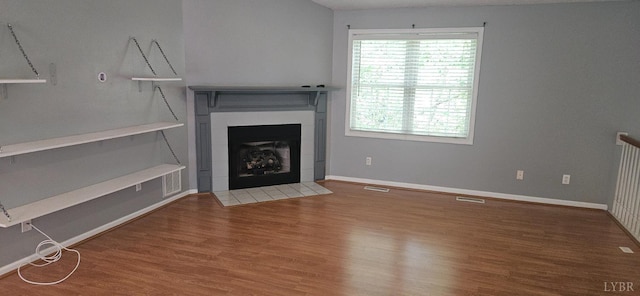 511 Bent Oak Ct, Lynchburg, VA 24502 - unfurnished living room featuring a fireplace and wood finished floors