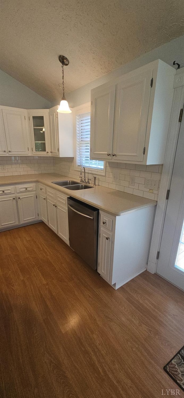 511 Bent Oak Ct, Lynchburg, VA 24502 - kitchen with stainless steel dishwasher, dark wood-style flooring, white cabinetry, backsplash, and plenty of natural light
