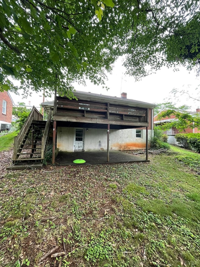 609 Hood St, Lynchburg, VA 24501 - rear view of house featuring stairs and a chimney