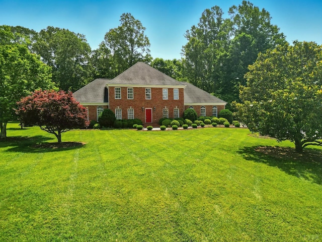 103 Waterton Dr, Lynchburg, VA 24503 - colonial-style house featuring a front yard and brick siding