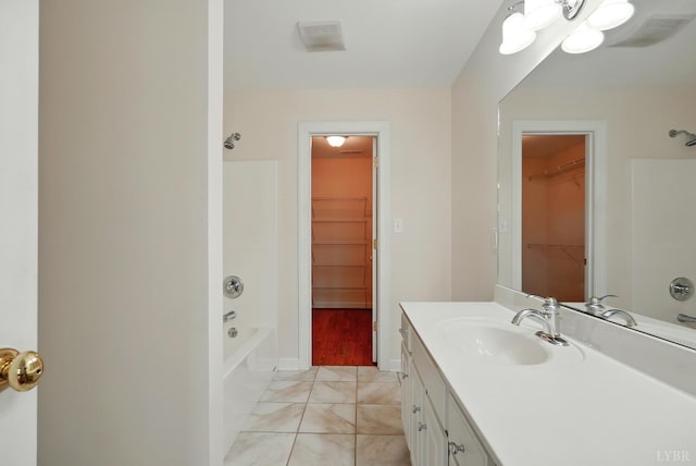 103 Waterton Dr, Lynchburg, VA 24503 - full bathroom with vanity, a spacious closet, and shower / tub combination