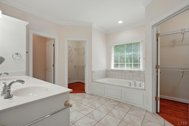 103 Waterton Dr, Lynchburg, VA 24503 - full bath featuring a spacious closet, a bath, ornamental molding, double vanity, and tile patterned floors