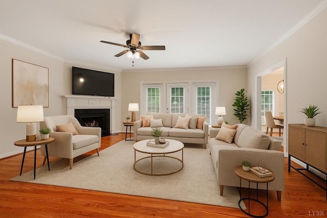 103 Waterton Dr, Lynchburg, VA 24503 - living area with plenty of natural light, crown molding, a ceiling fan, a fireplace with flush hearth, and wood finished floors