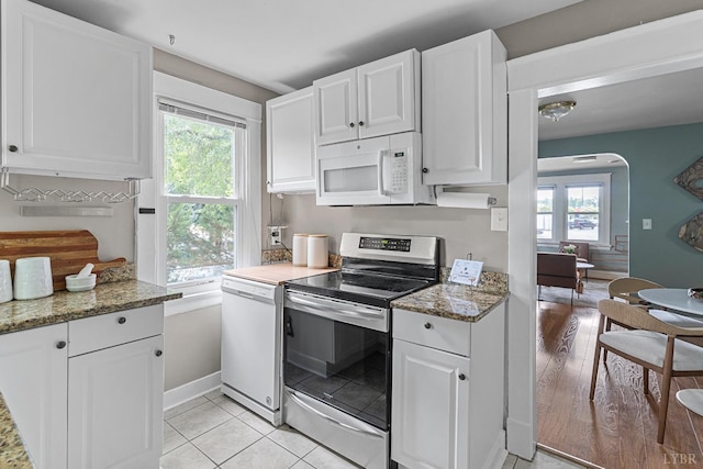 1708 Westwood Ave, Richmond, VA 23227 - kitchen with white appliances, healthy amount of natural light, and white cabinetry