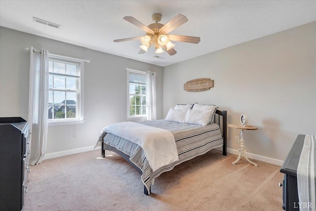 1061 Cedar Sky Ct, Forest, VA 24551 - bedroom with light carpet, baseboards, and a ceiling fan