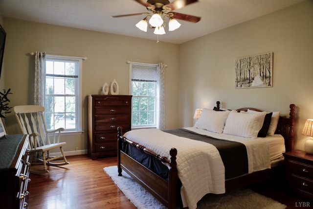 1061 Cedar Sky Ct, Forest, VA 24551 - bedroom featuring wood finished floors, baseboards, and ceiling fan