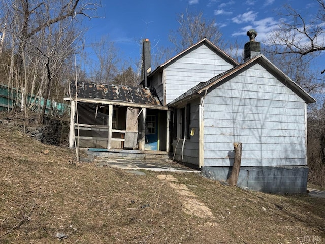 5698 Rockfish River Rd, Schuyler, VA 22969 - back of property with a chimney