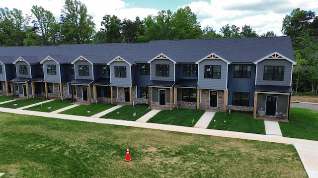 66 Pelt Ln, Evington, VA 24550 - view of property featuring stone siding and a front lawn