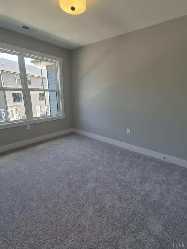 66 Pelt Ln, Evington, VA 24550 - carpeted spare room featuring baseboards