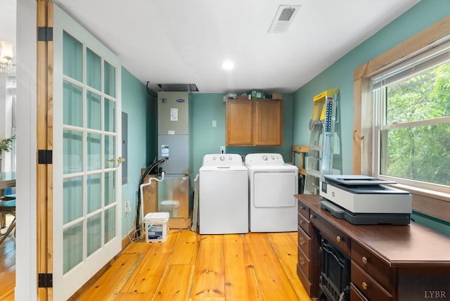 1801 Floyd St, Lynchburg, VA 24501 - laundry room featuring cabinet space, washing machine and dryer, light wood-style flooring, and recessed lighting