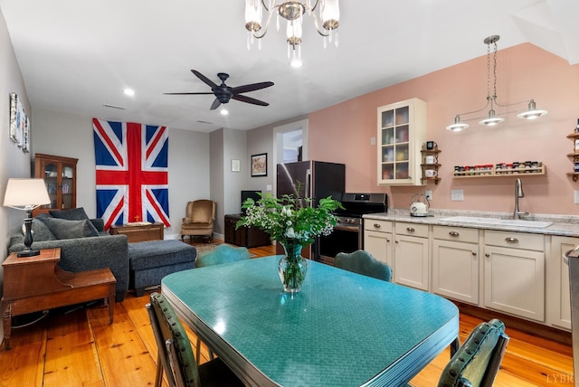 1801 Floyd St, Lynchburg, VA 24501 - dining room with light wood-type flooring, ceiling fan, a chandelier, and recessed lighting