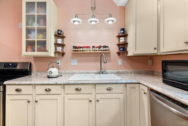 1801 Floyd St, Lynchburg, VA 24501 - kitchen featuring appliances with stainless steel finishes, a sink, glass insert cabinets, and white cabinetry