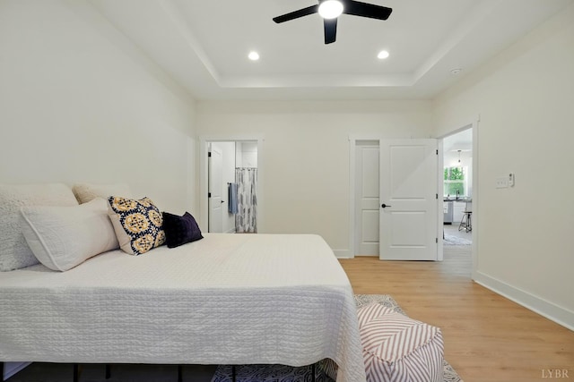 3580 Double Bridges Rd, Spout Spring, VA 24593 - bedroom featuring light wood-type flooring, a raised ceiling, recessed lighting, baseboards, and ceiling fan