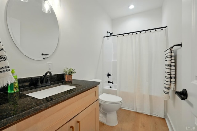 3580 Double Bridges Rd, Spout Spring, VA 24593 - full bathroom featuring vanity, toilet, wood finished floors, shower / bath combo with shower curtain, and recessed lighting