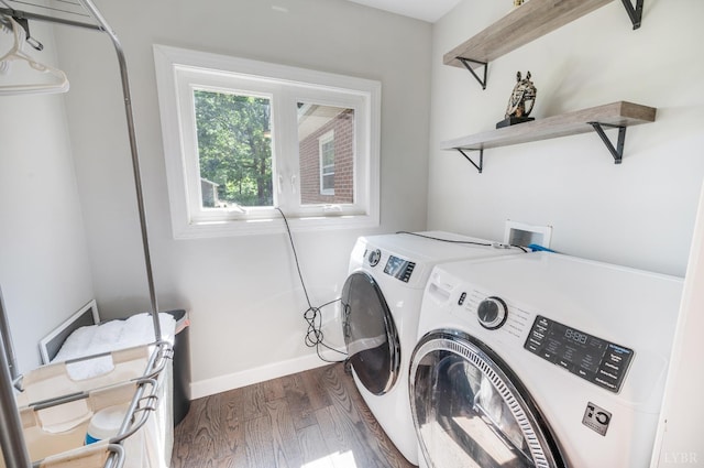 206 Huffmond St, Gretna, VA 24557 - washroom featuring separate washer and dryer and dark wood-style flooring