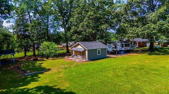 206 Huffmond St, Gretna, VA 24557 - view of grassy yard featuring a shed