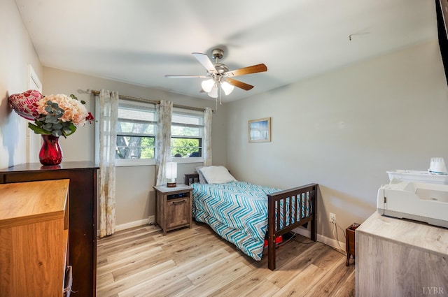 206 Huffmond St, Gretna, VA 24557 - bedroom with light wood finished floors and a ceiling fan