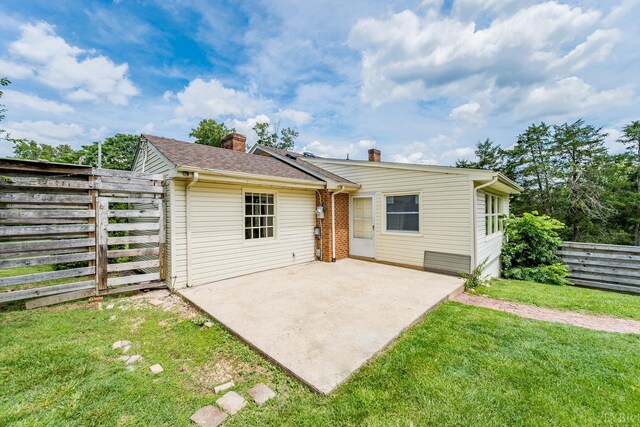 2207 Indian Hill Rd, Lynchburg, VA 24503 - back of house with a chimney and a patio area