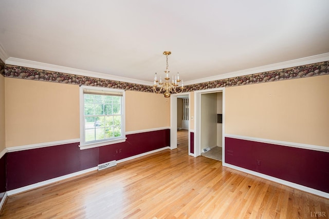 2207 Indian Hill Rd, Lynchburg, VA 24503 - empty room with a chandelier, wood finished floors, and crown molding