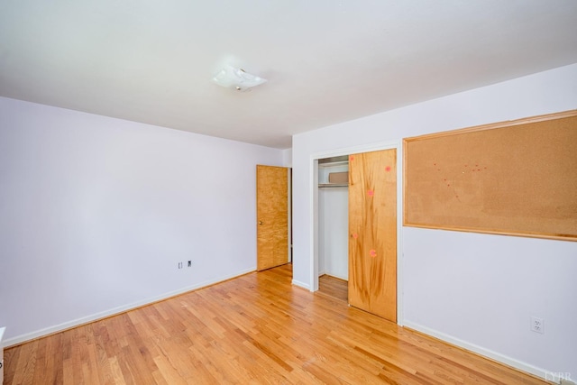 2207 Indian Hill Rd, Lynchburg, VA 24503 - unfurnished bedroom with wood finished floors and a closet