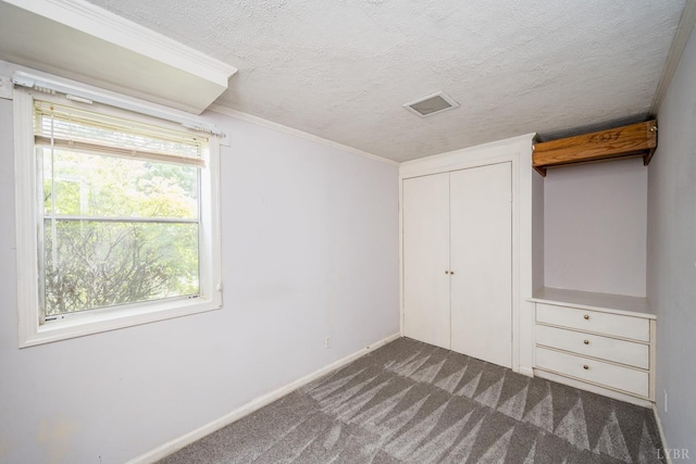 2207 Indian Hill Rd, Lynchburg, VA 24503 - unfurnished bedroom featuring dark carpet, a textured ceiling, and a closet