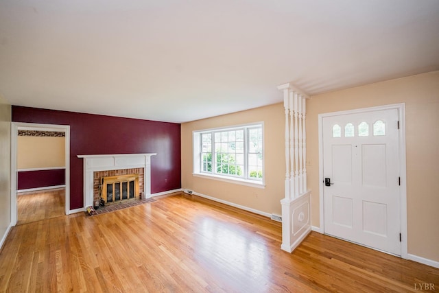 2207 Indian Hill Rd, Lynchburg, VA 24503 - entrance foyer with light wood-type flooring and a fireplace