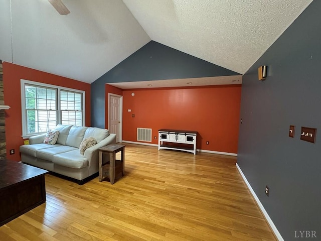 8 Northgate Ct, Lynch Station, VA 24571 - living room featuring light wood-style floors, high vaulted ceiling, a textured ceiling, and ceiling fan