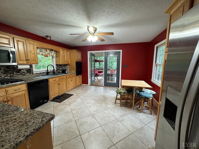 8 Northgate Ct, Lynch Station, VA 24571 - kitchen featuring black appliances, decorative backsplash, a ceiling fan, light tile patterned flooring, and a textured ceiling
