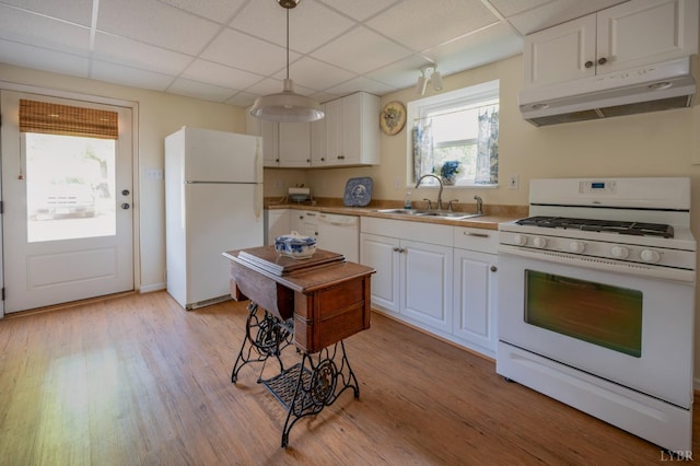 136 Timber Ridge Dr, Forest, VA 24551 - kitchen featuring white appliances, under cabinet range hood, a drop ceiling, white cabinetry, and light wood finished floors