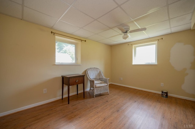 136 Timber Ridge Dr, Forest, VA 24551 - unfurnished room with a drop ceiling, wood finished floors, ceiling fan, and healthy amount of natural light